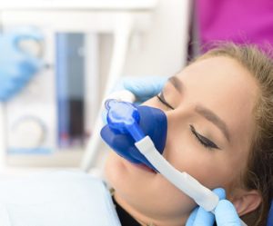 Woman at dentist using nitrous oxide