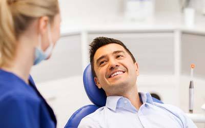 smiling man who is a good candidate for dental implants in Grove City